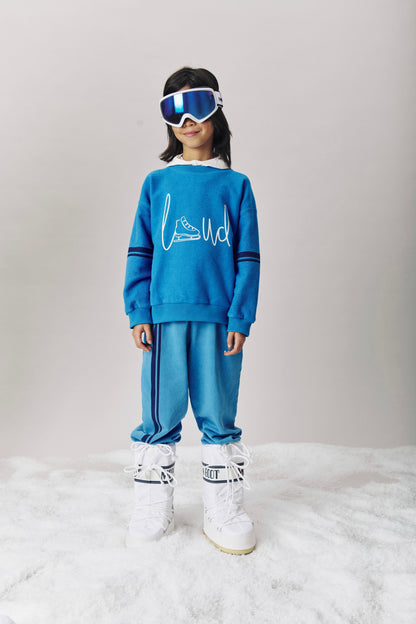 HIGH - MALIBU BLUE SWEATER relaxed fit drop shoulder, contrast stripe sleeve LOUD SKATE print